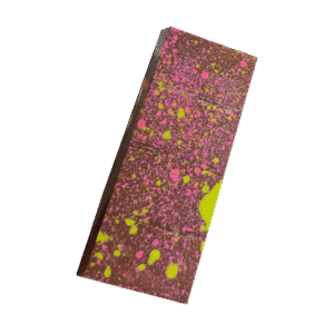 Handmade dark chocolate bark bar sprinkled with pistachios.
