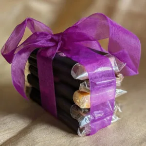 Purple ribbon luxury chocolate gift packaging close-up