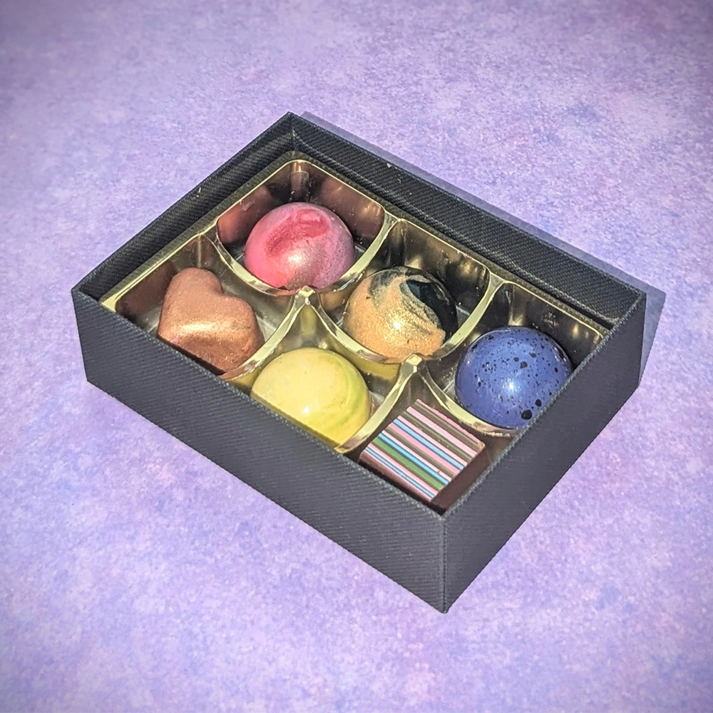 Vegan cocktail-flavoured chocolates with tasting guide card