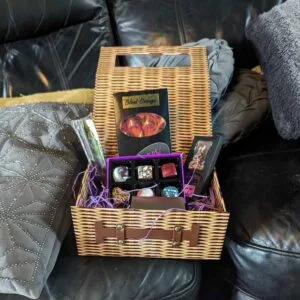 Chocolate gift hamper with assorted truffles and bars by Chocolates by Design.