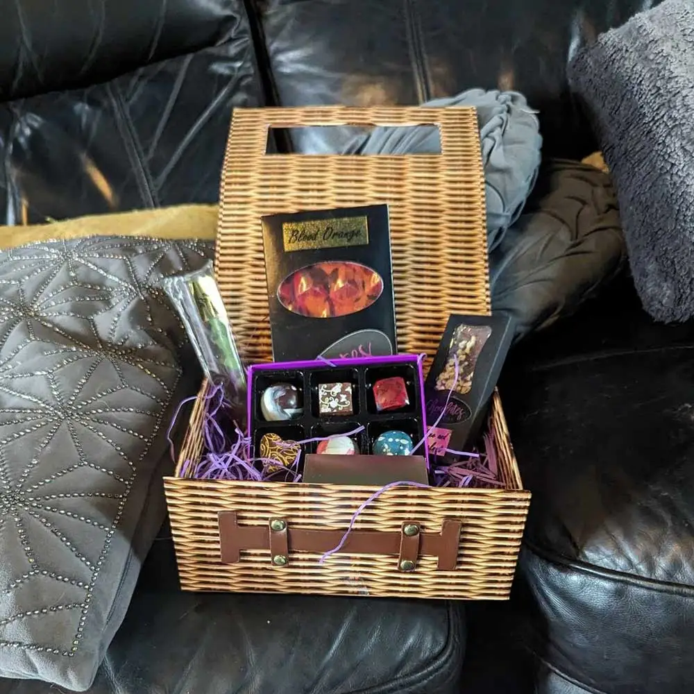 Chocolate gift hamper with assorted truffles and bars by Chocolates by Design.