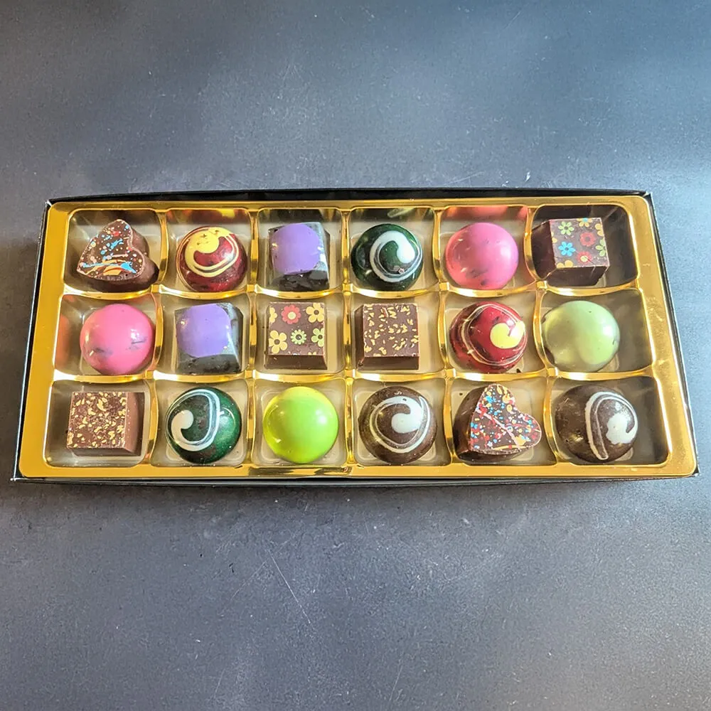 Handmade vegan dessert chocolates in luxury presentation box