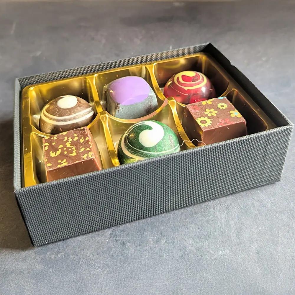 Premium vegan chocolate truffles inspired by classic desserts