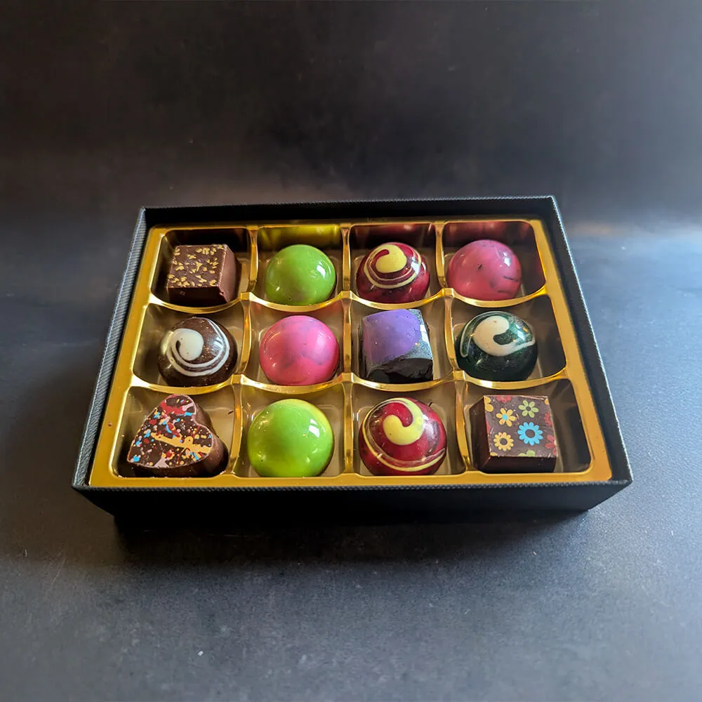 Luxury vegan chocolate gift box with colourful artisan chocolates