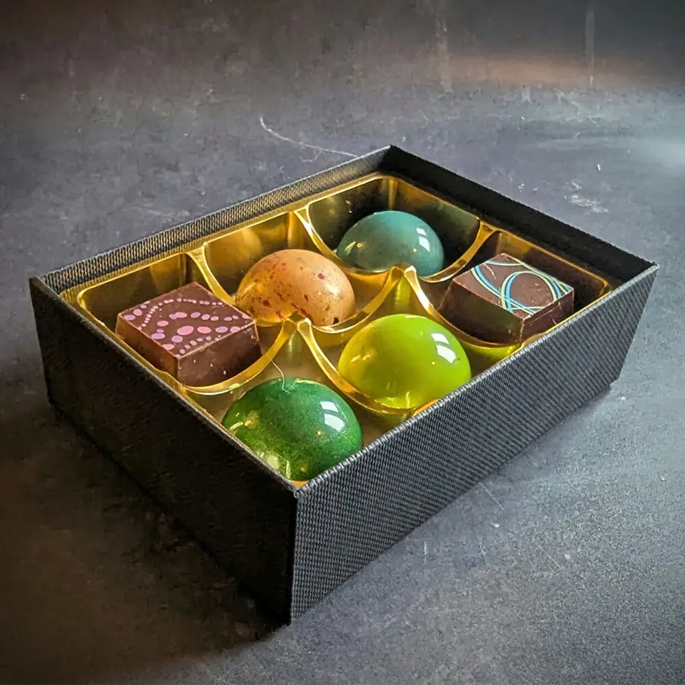Dessert-inspired vegan chocolates and flavour guide card