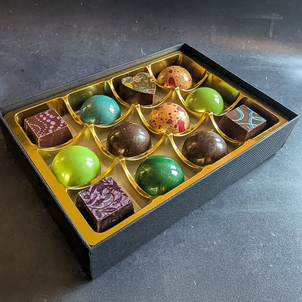 Artisan vegan chocolates with unique handcrafted decorations