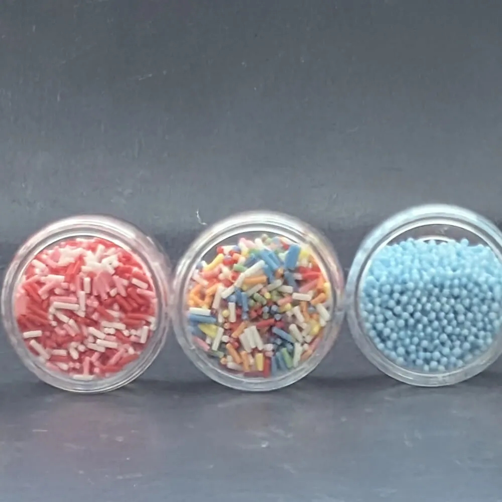Set of colourful chocolate sprinkles for decorating desserts.