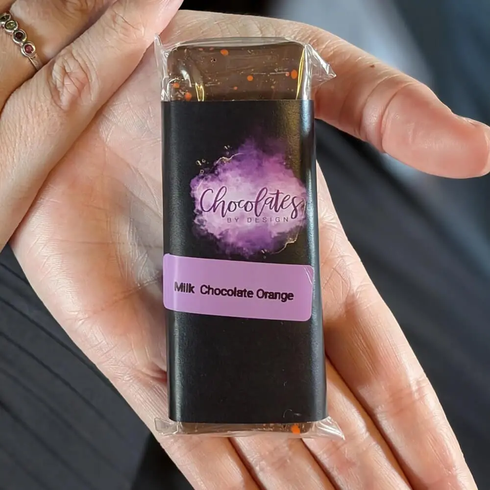 Luxury chocolate gift box displayed on smartphone screen
