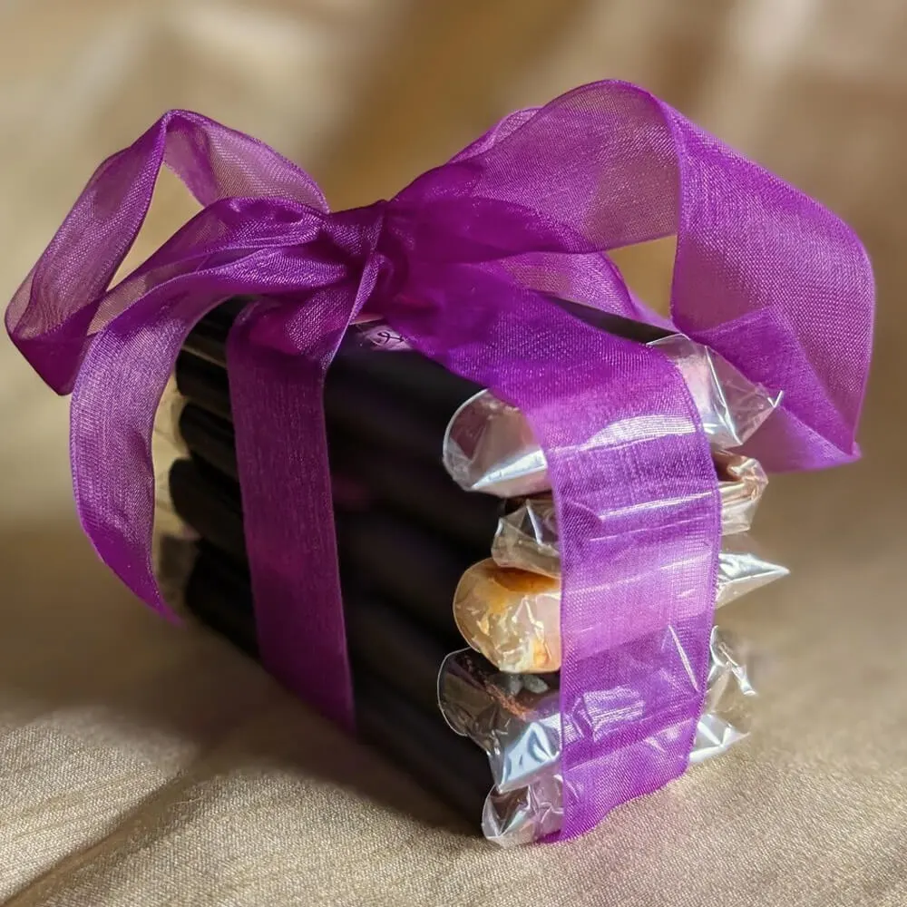 Purple ribbon luxury chocolate gift packaging close-up