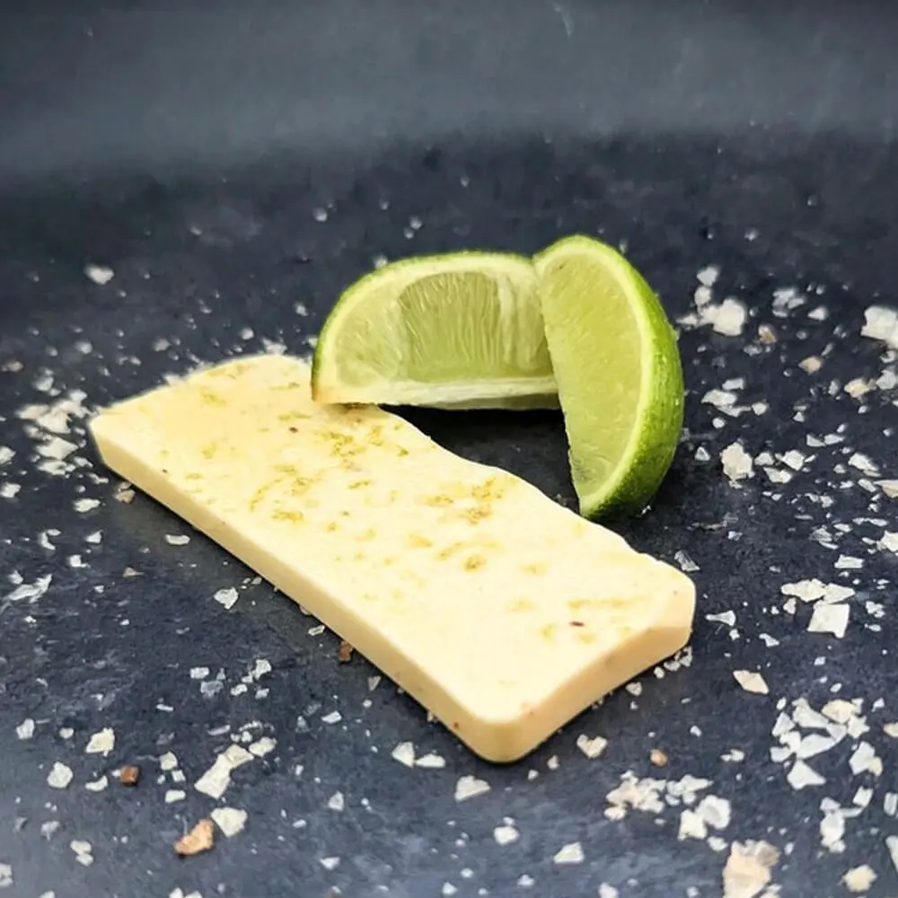 Handmade lime-infused chocolate bar with gourmet ingredients